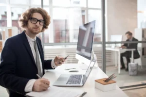 man is using computer