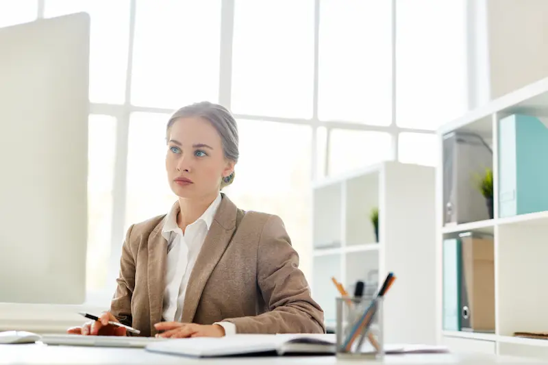a lady is using computer
